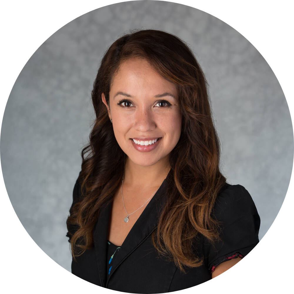 Elisa Ortega-Schultz smiling for her GVSU headshot